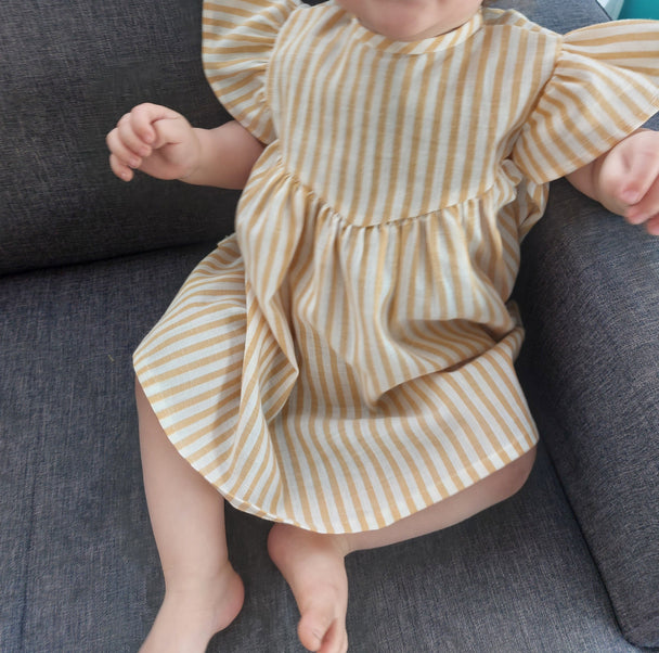 Vestido alas 2 algodón lino - Lina Sustentable, ropa Niño Chile, ropa de niño en oferta